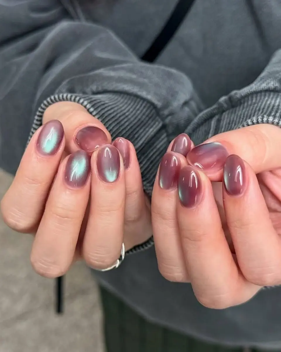 Elegant cat eye nails with a purple shimmer