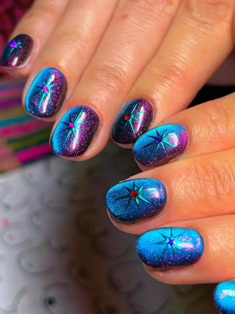 Vibrant blue glitter cat eye nail design