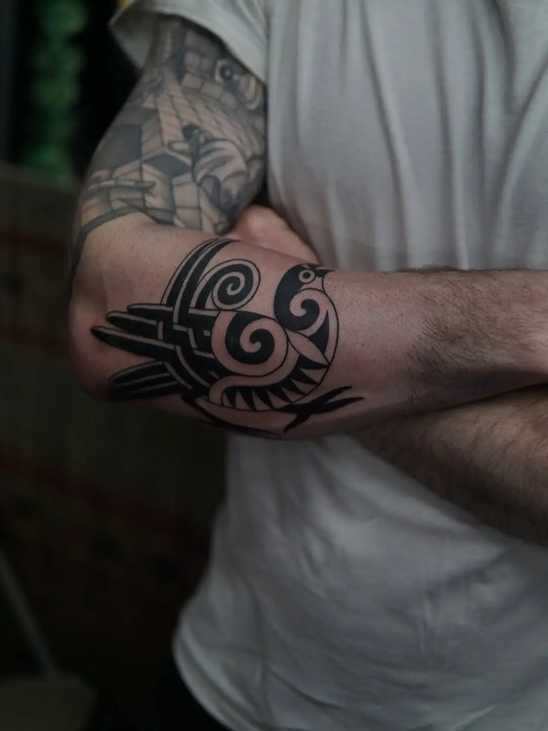 Stylish Celtic bird tattoo showcasing intricate details