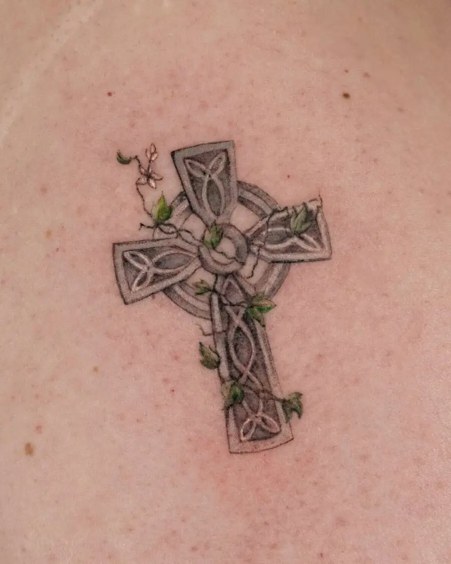 Intricate Celtic cross with nature elements