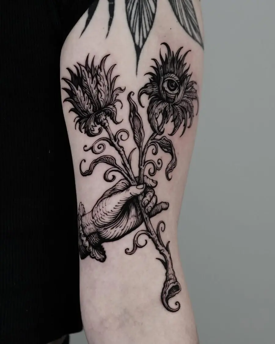 Intricate floral Celtic tattoo design for arm