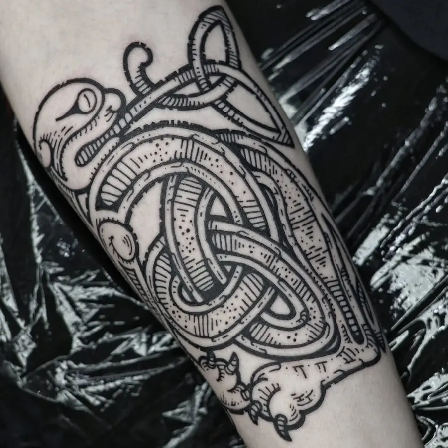 Intricate black ink Celtic knot tattoo design