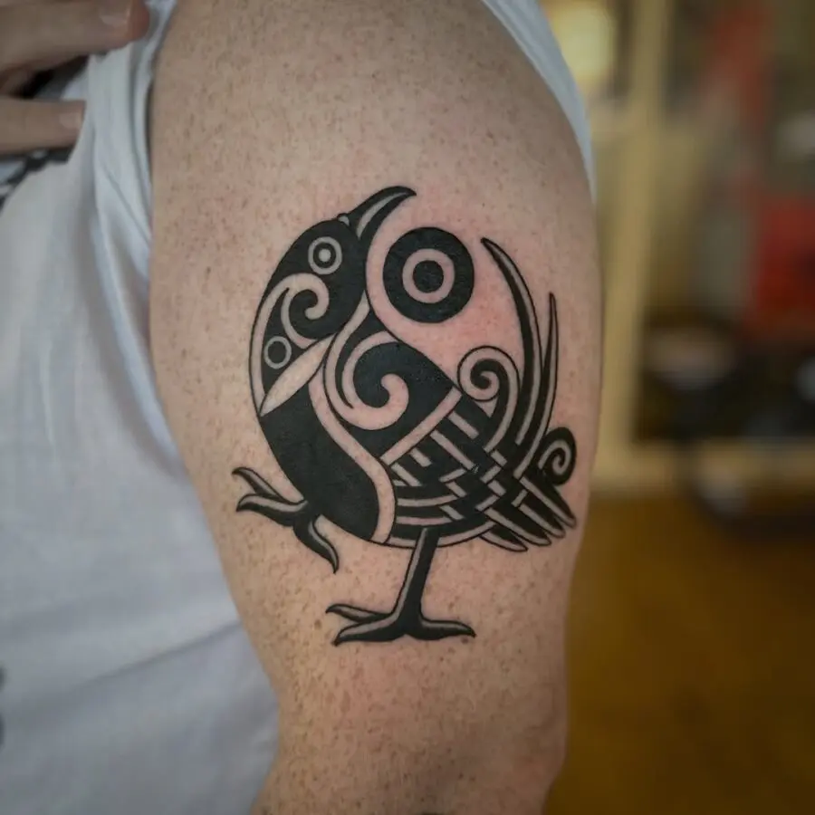Intricate Celtic bird design in bold ink