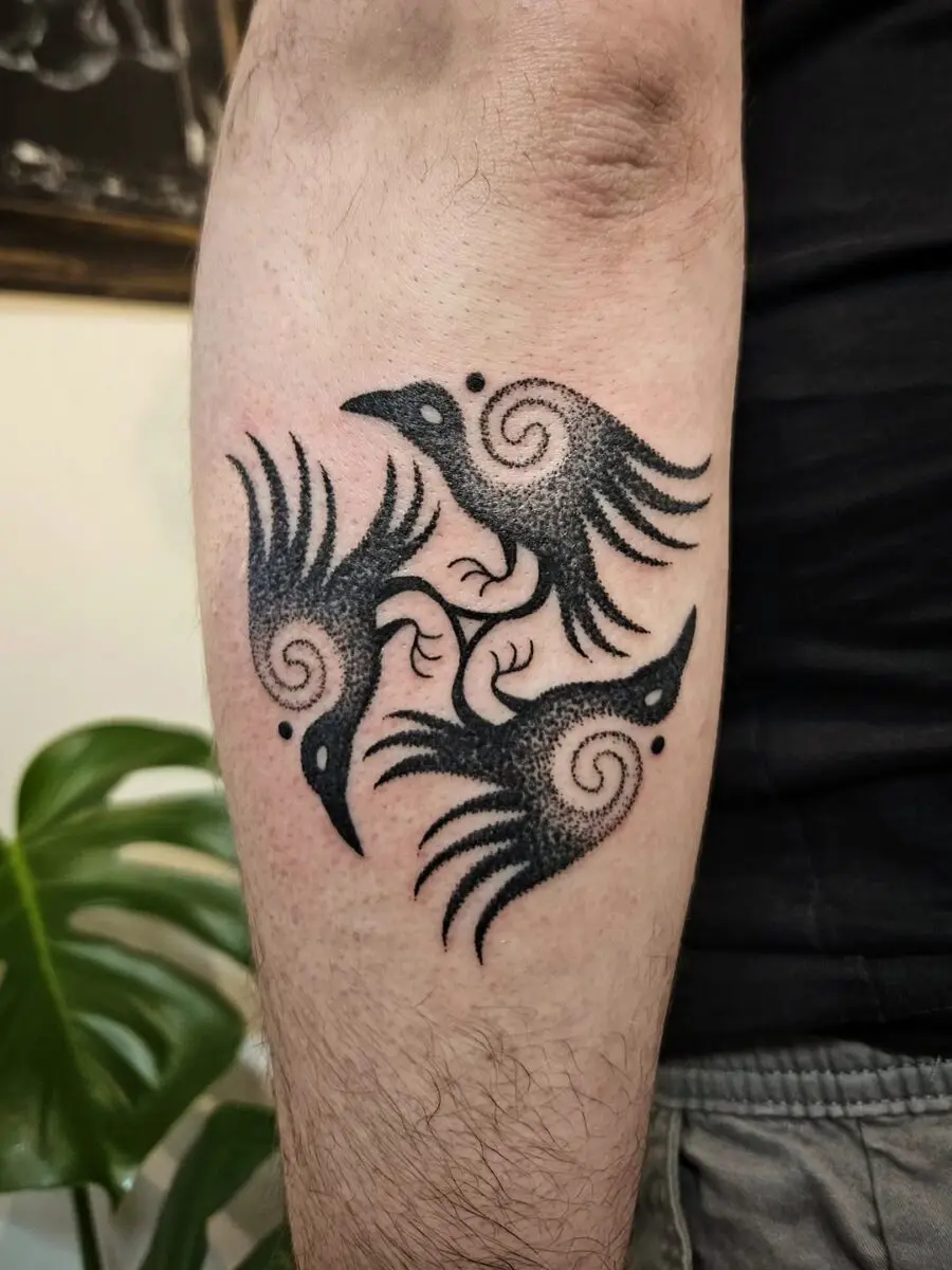 Elegant Celtic-inspired bird tattoo design