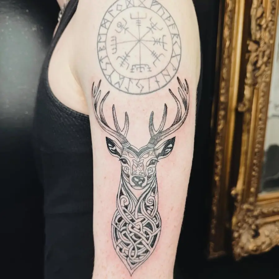 Intricate Celtic deer tattoo representing strength and wisdom