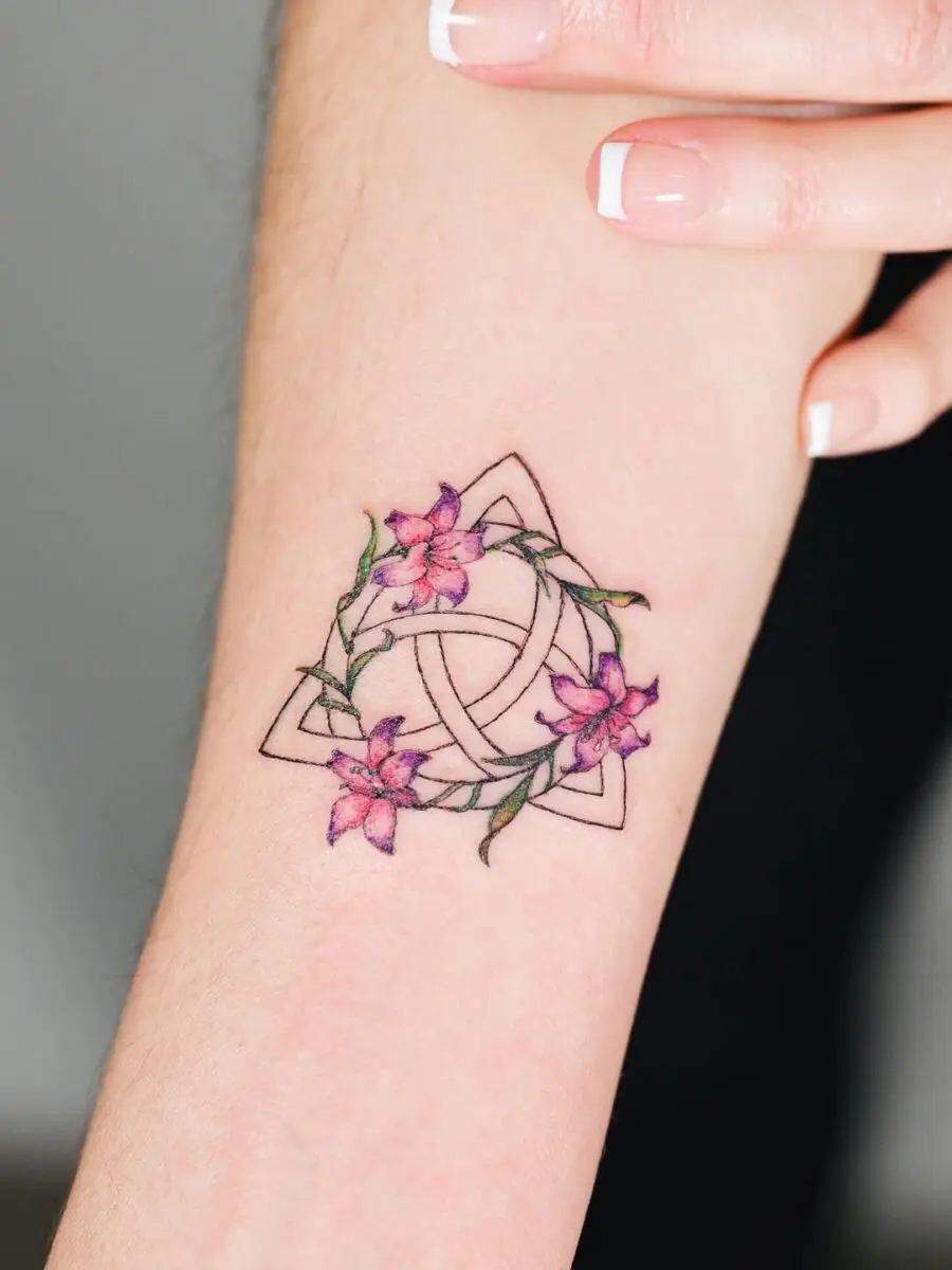 Trinity knot with floral embellishments