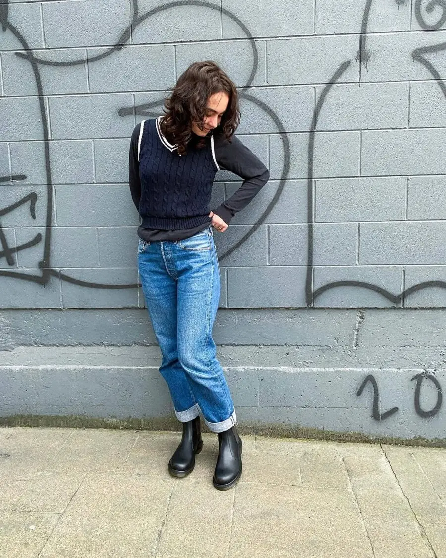 Casual chic: Chelsea boots with jeans and vest