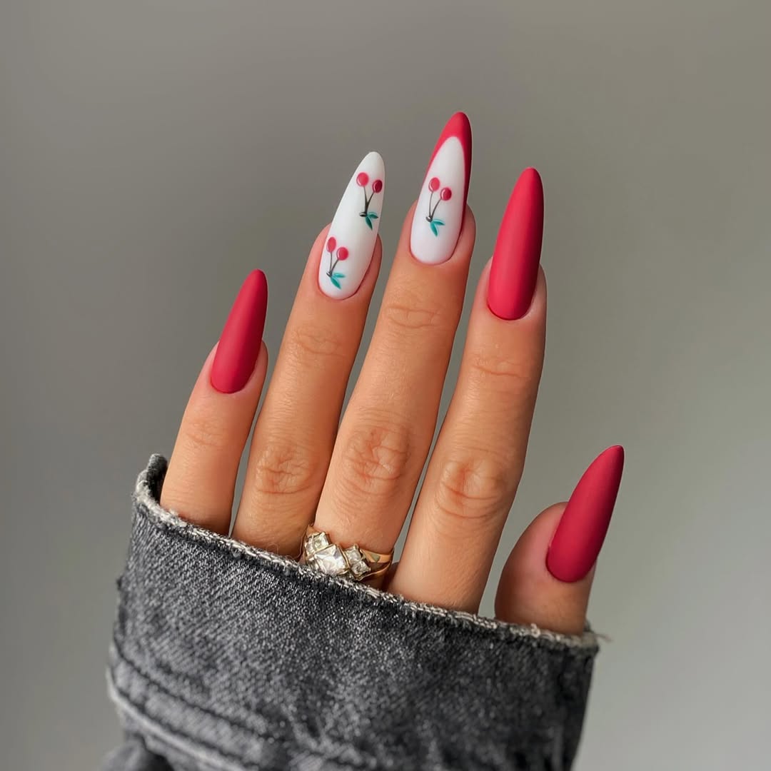 Chic Cherry Nail Art with Floral Accents