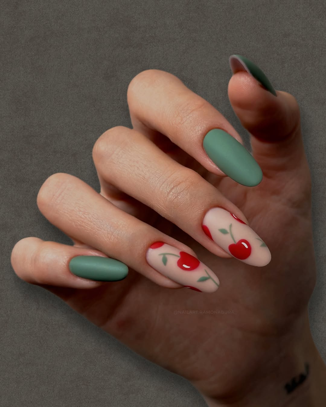 Charming Cherry Nail Art Design with Green Accents