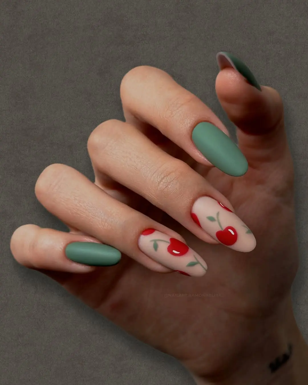 Charming Cherry Nail Art Design with Green Accents