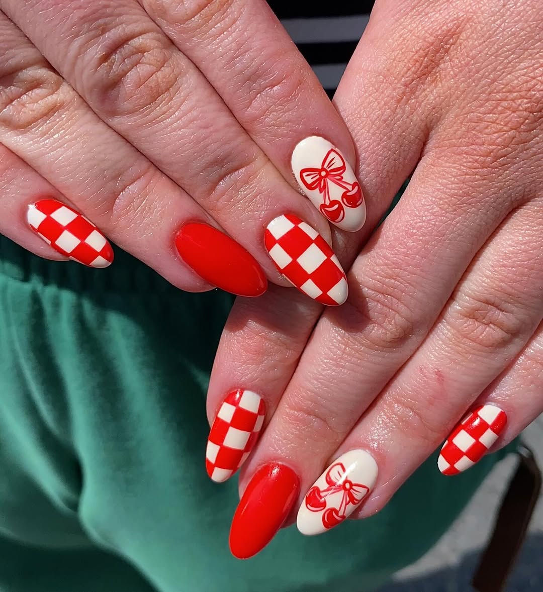 Charming cherry nail design for a vibrant look