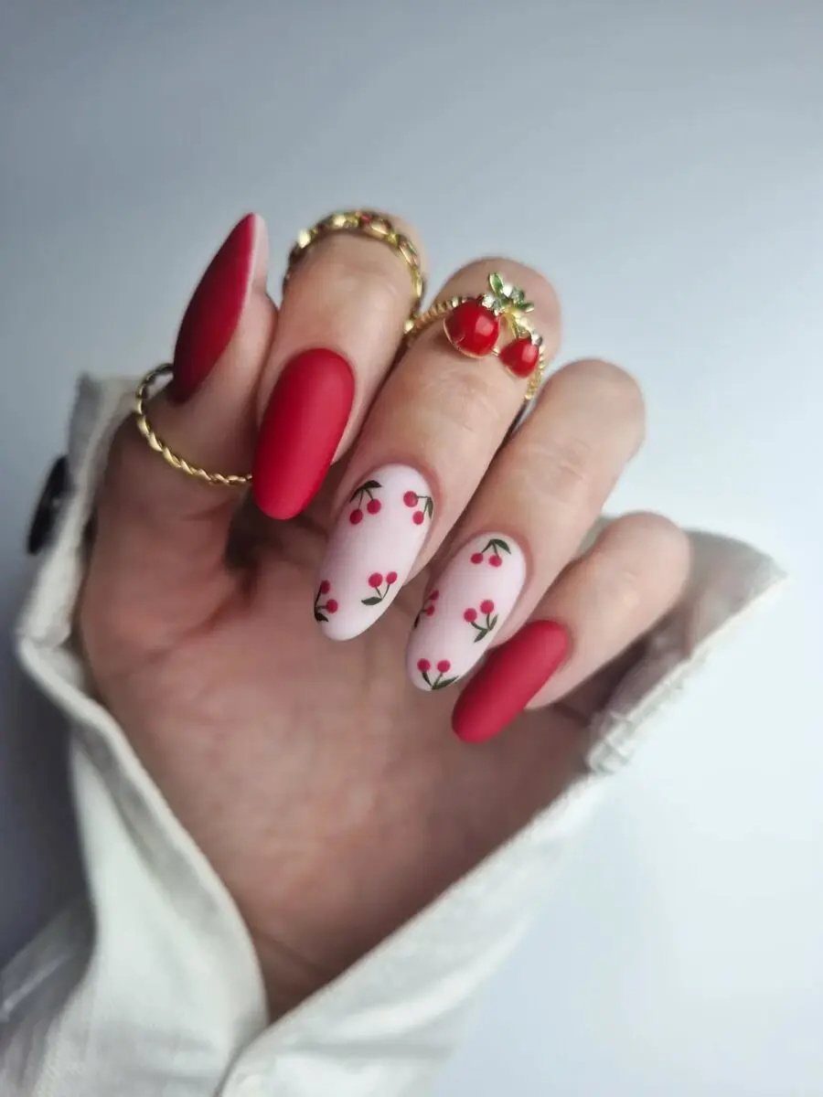 Chic cherry-themed nail art for summer vibes