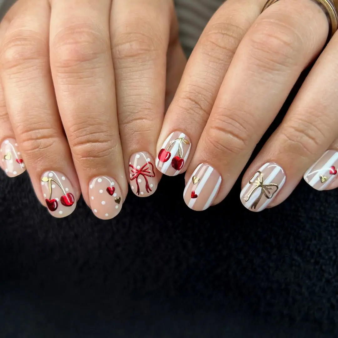 Charming cherry nails with cute accents