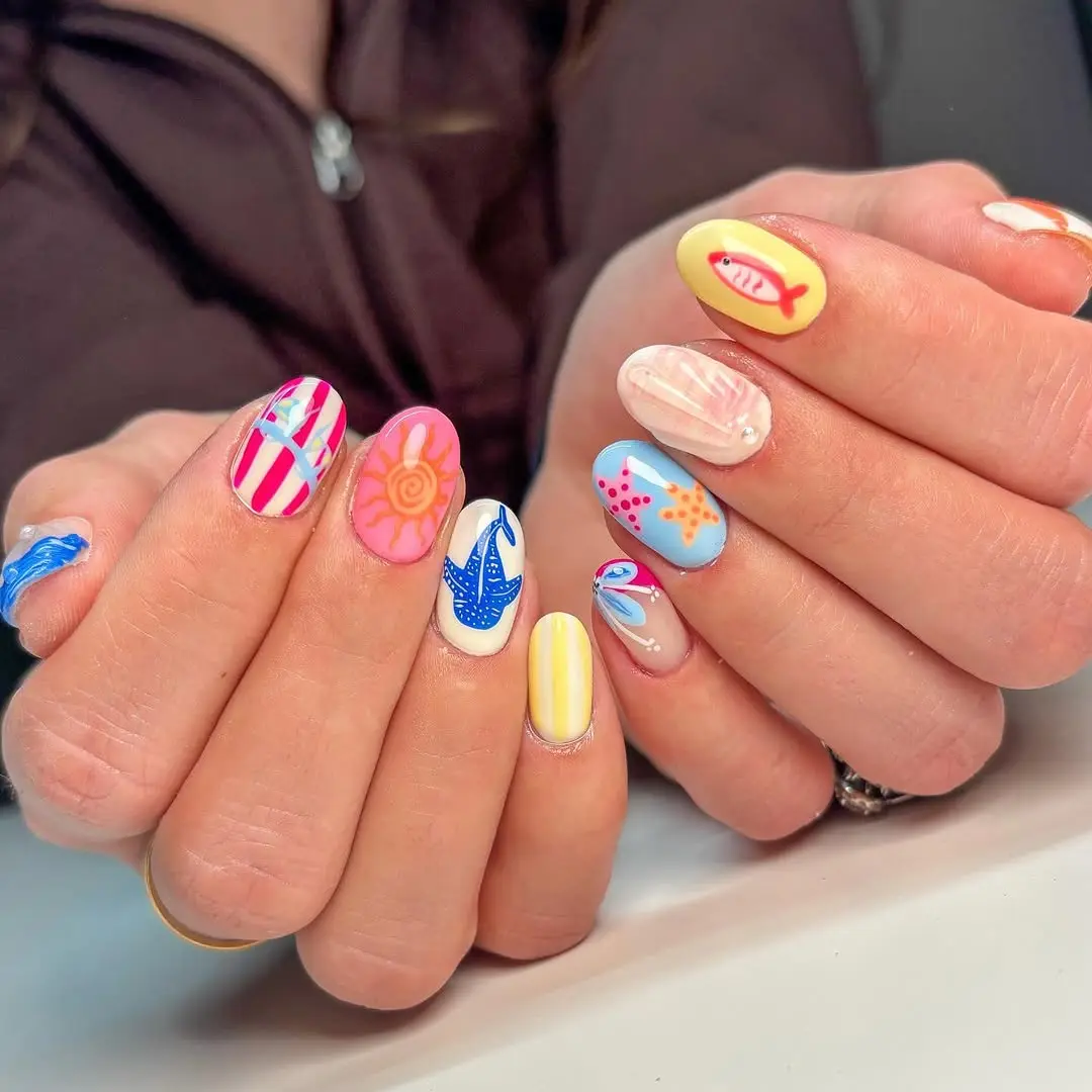 Vibrant beach nails with playful summer themes