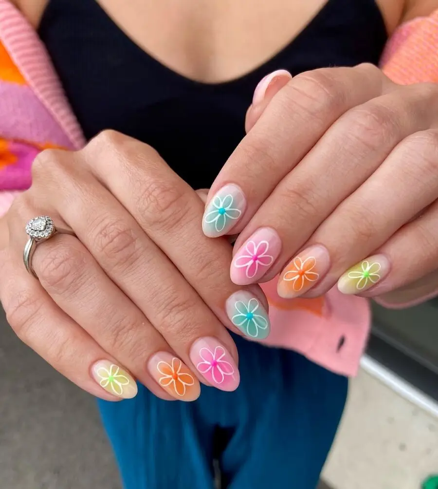 Stunning floral designs on nude nails