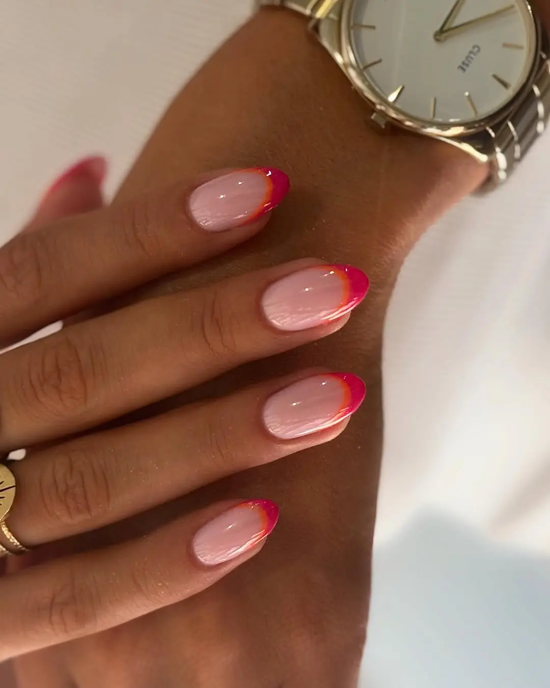 Vibrant pink ombre French tip design