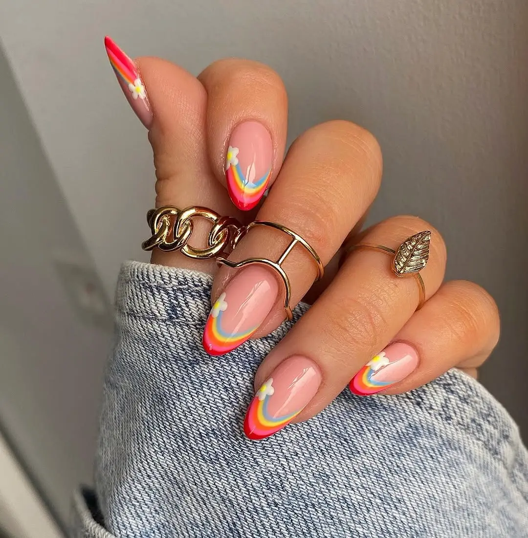 Vibrant Rainbow French Tips with Floral Accents