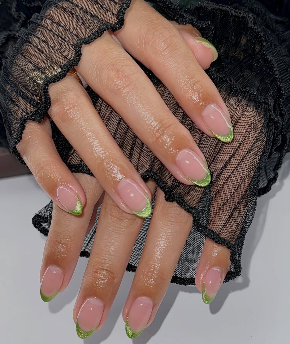Chic green-tipped French manicure for vibrant style