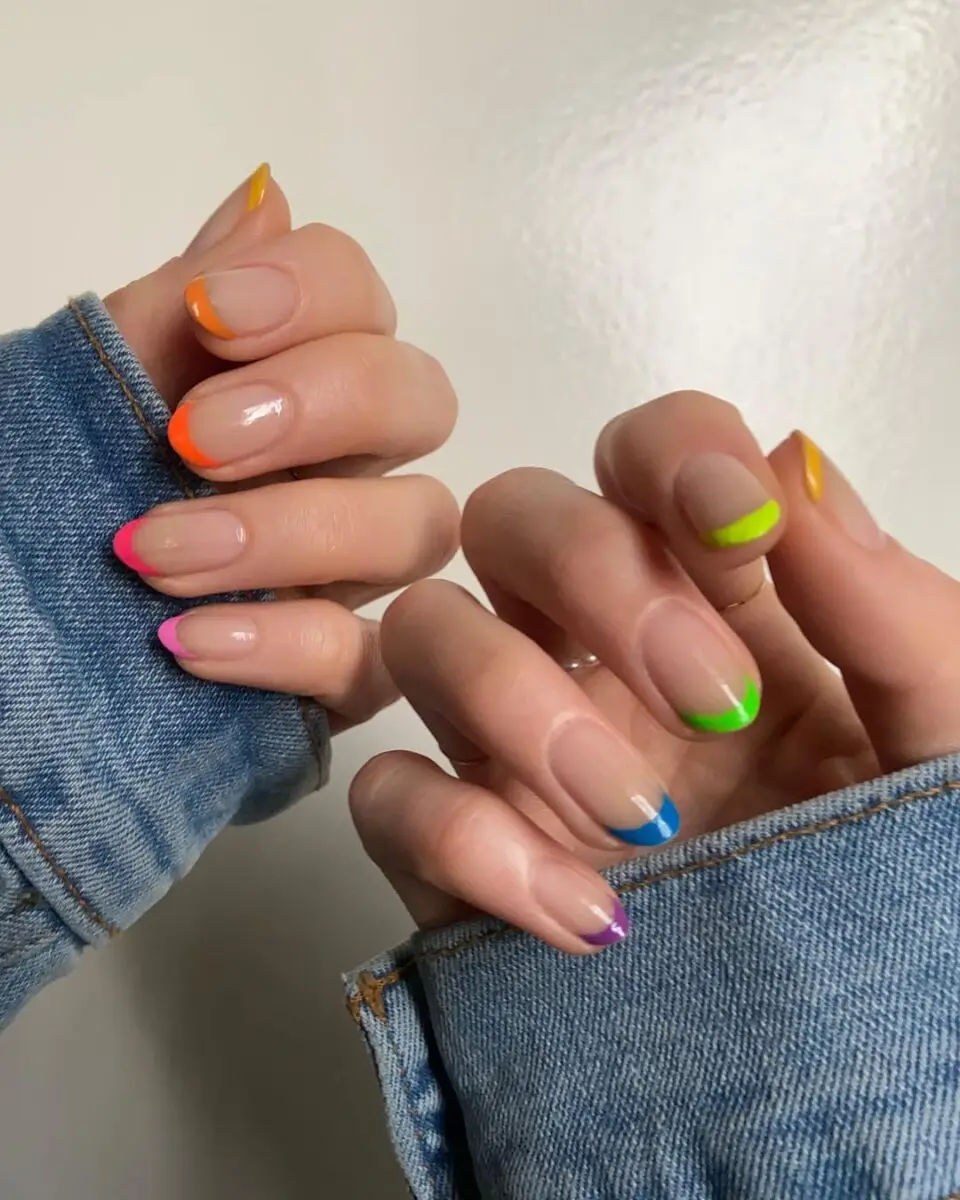 Vibrant neon French tip nail art