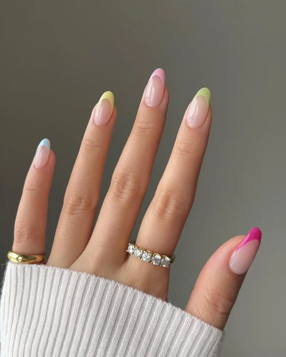 Vibrant pastel French tip nails for summer