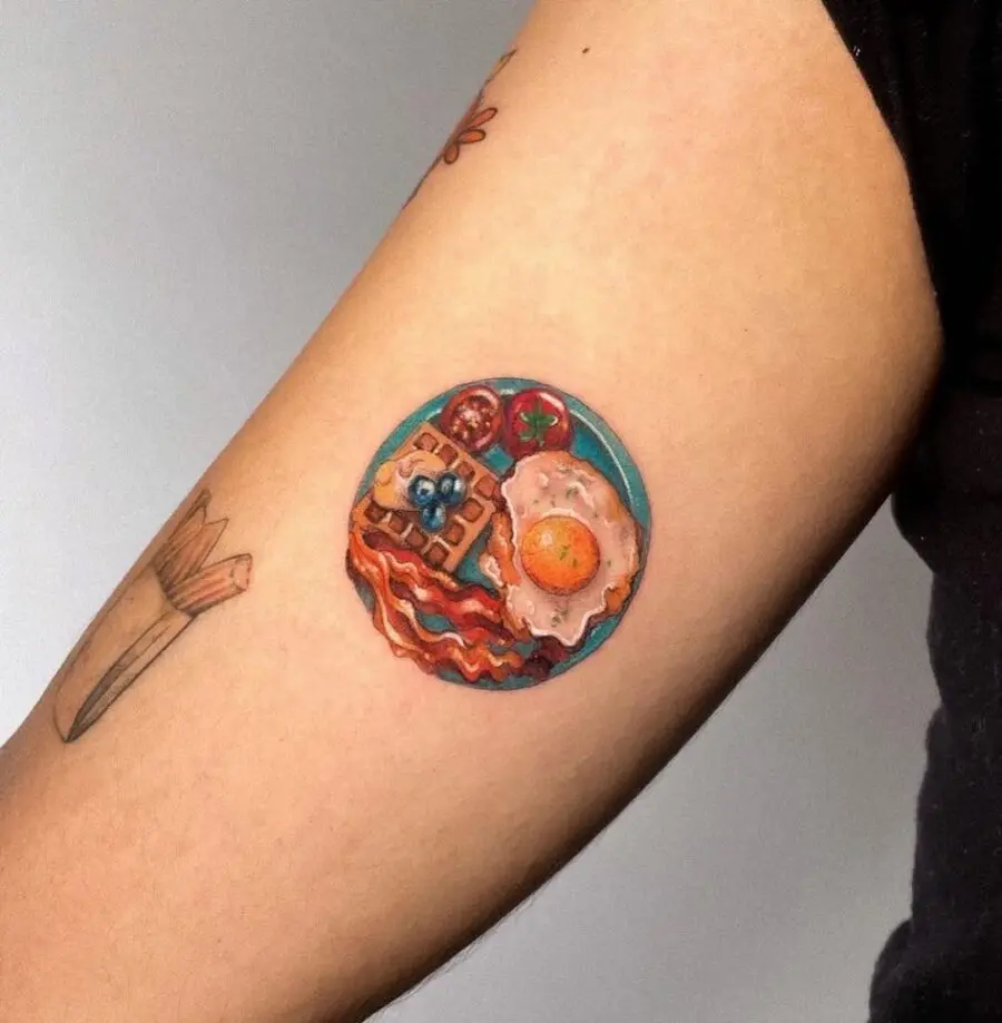 Whimsical waffle tattoo with breakfast elements