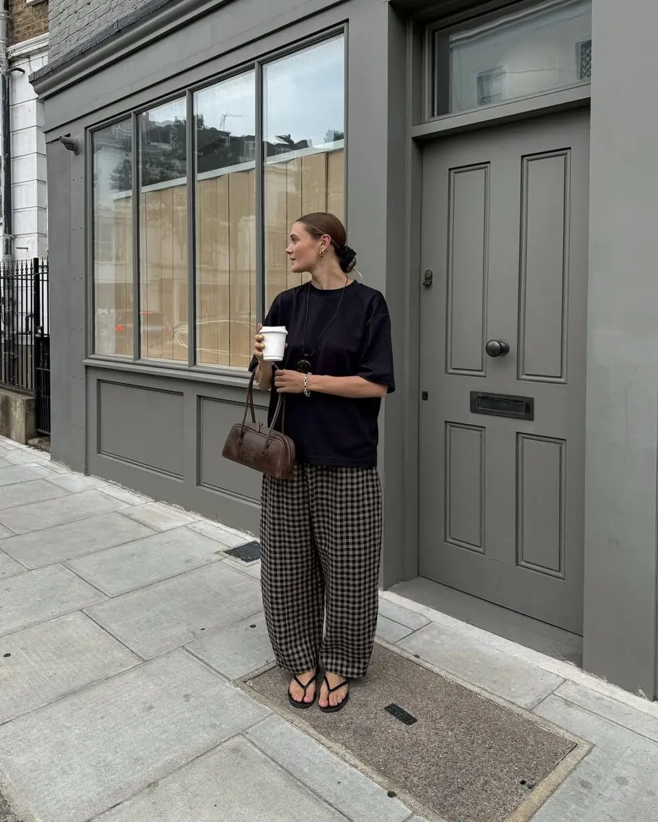 Effortless chic with checkered pants and black top