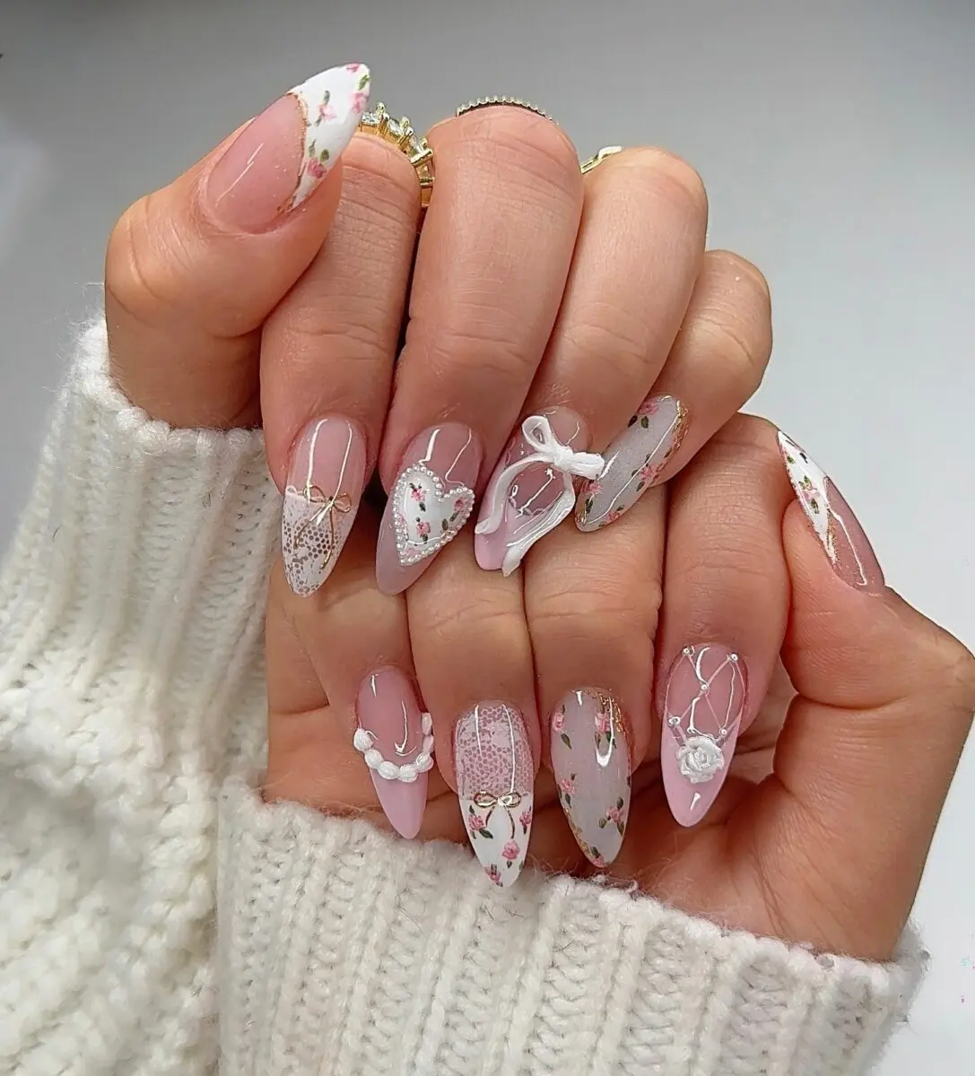 Elegant coquette nails with floral accents