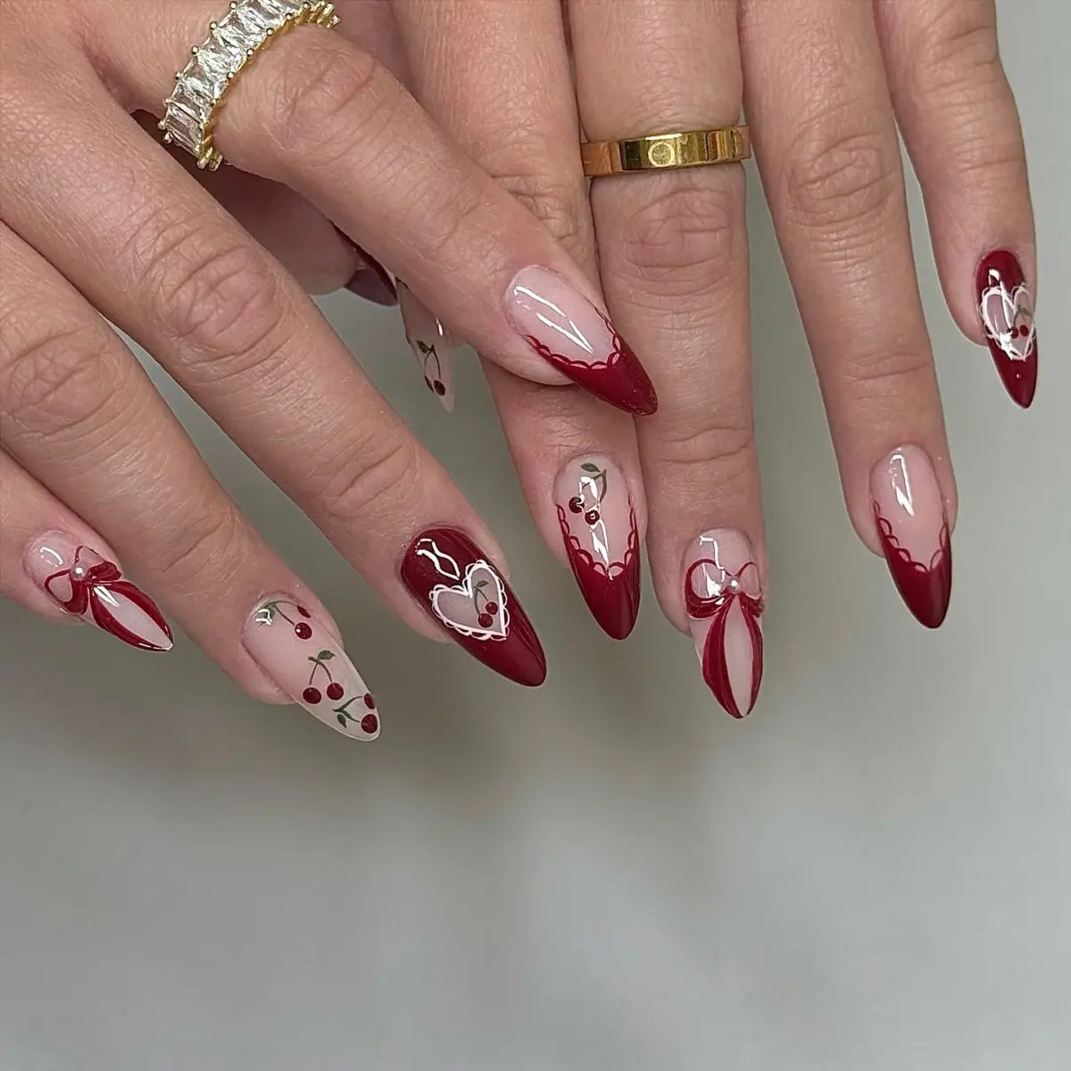 Chic coquette nails adorned with bows and hearts