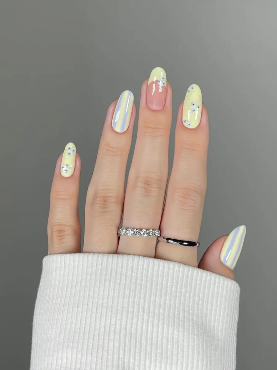 Playful pastel nails with chic detailing