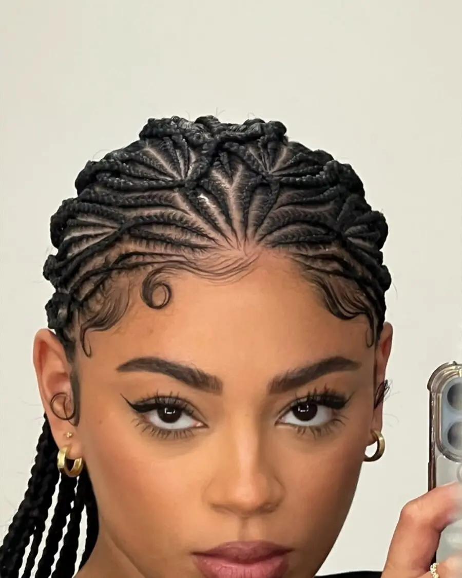 Elegant cornrows with stylish curls at the front