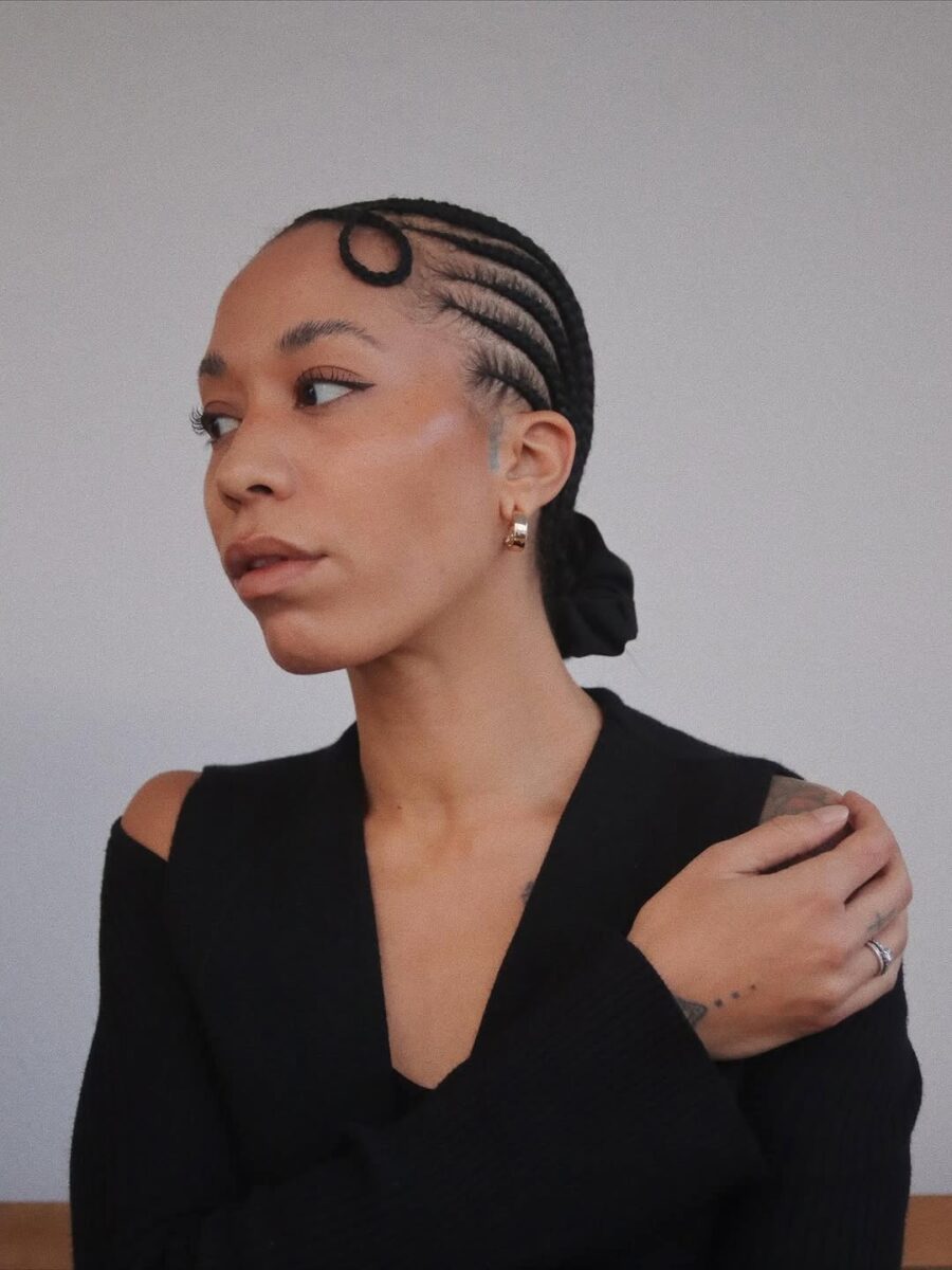 Elegant cornrows with chic twists and style