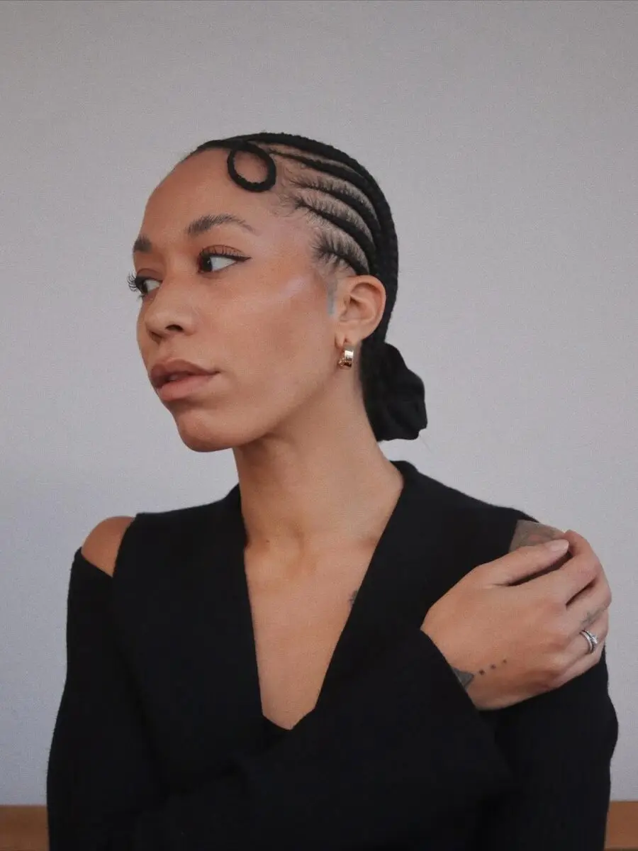 Elegant cornrows with chic twists and style