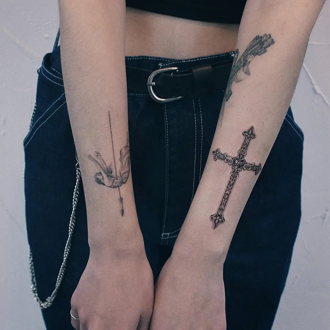 Elegant cross tattoos with unique placement