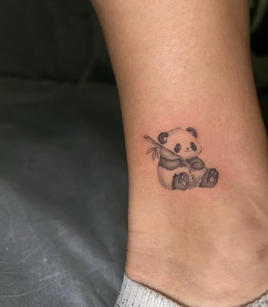 Adorable panda tattoo with playful charm