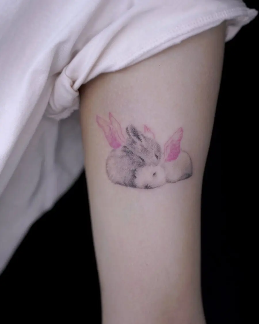 Charming Rabbit Tattoo with Delicate Wings