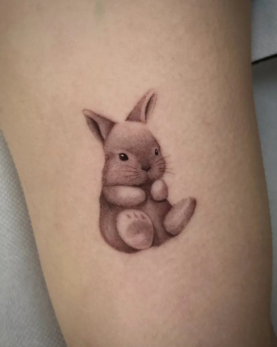 Charming rabbit tattoo showcasing adorable realism