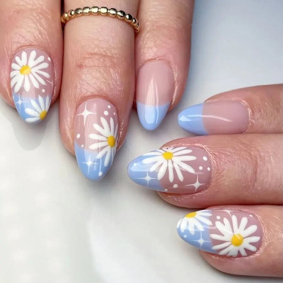Charming light blue daisy nails for summer vibes