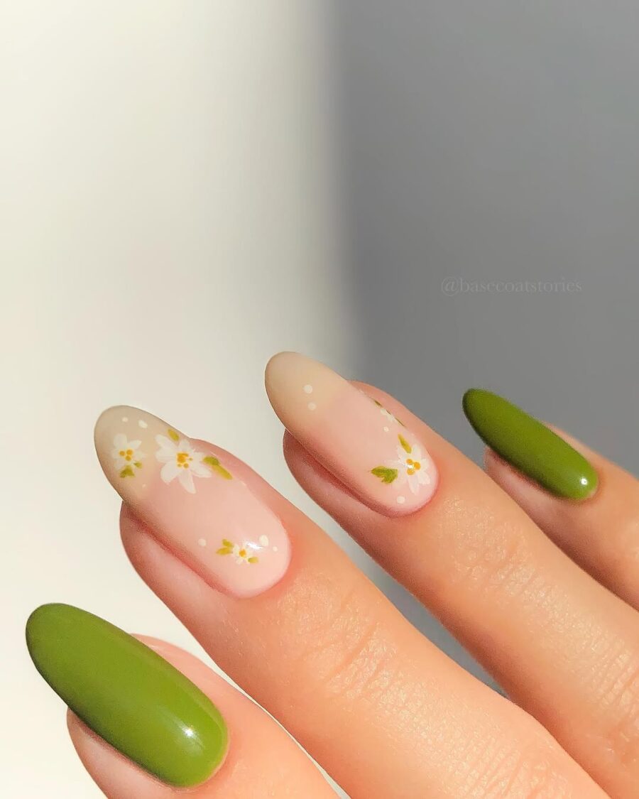 Charming daisy nail art with green accents