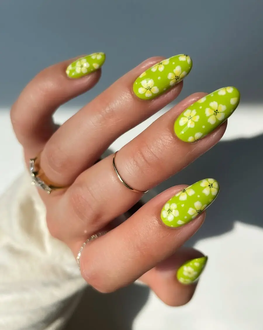 Vibrant Green Daisy Nail Art for Spring