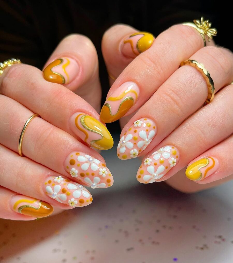 Charming Daisy Nails with Yellow Swirls