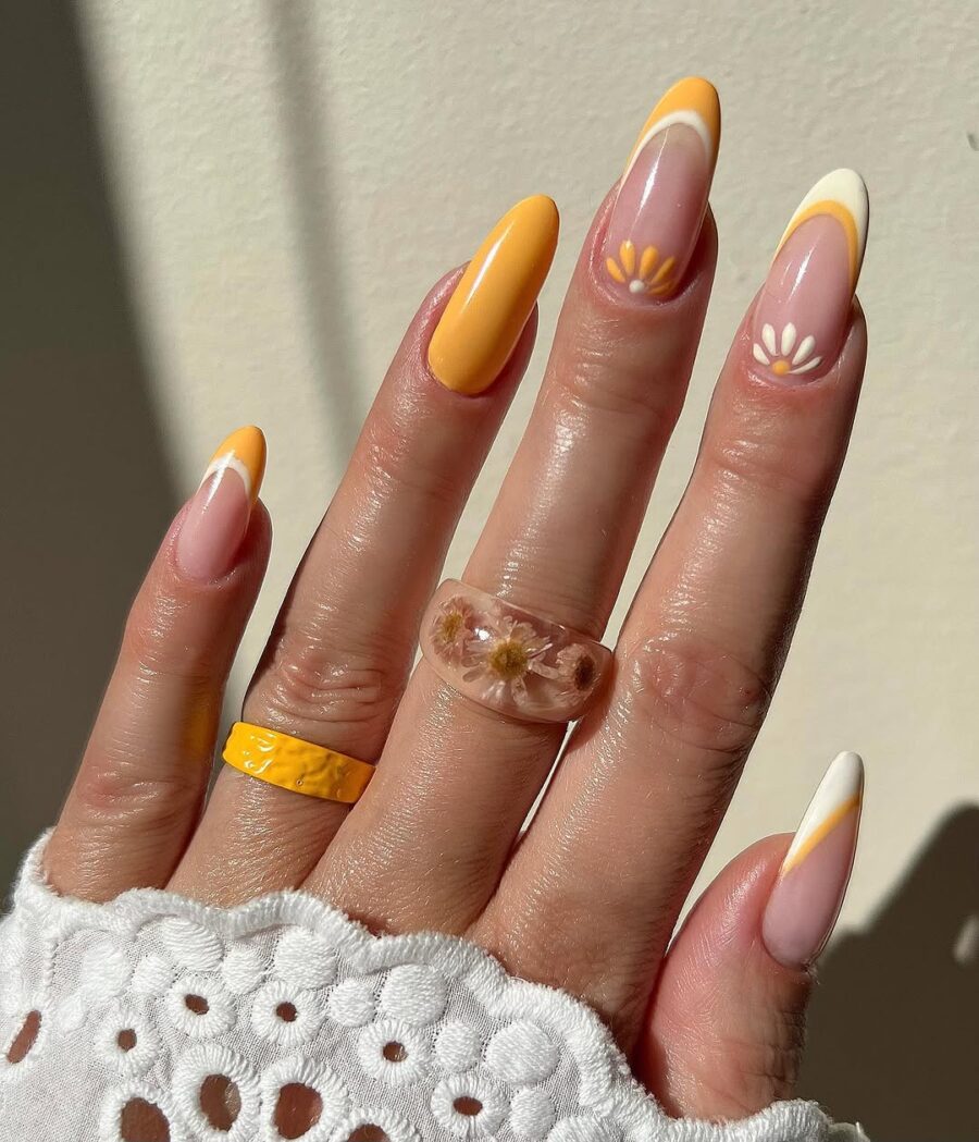 Bright and cheerful daisy nail design inspiration