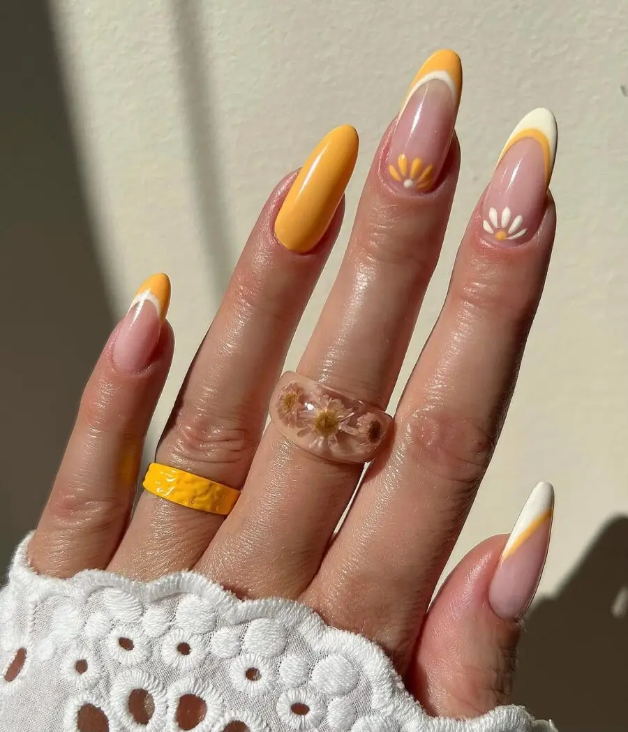 Bright and cheerful daisy nail design inspiration