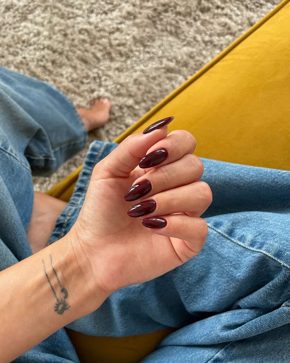 Elegant deep red oval nails for office style