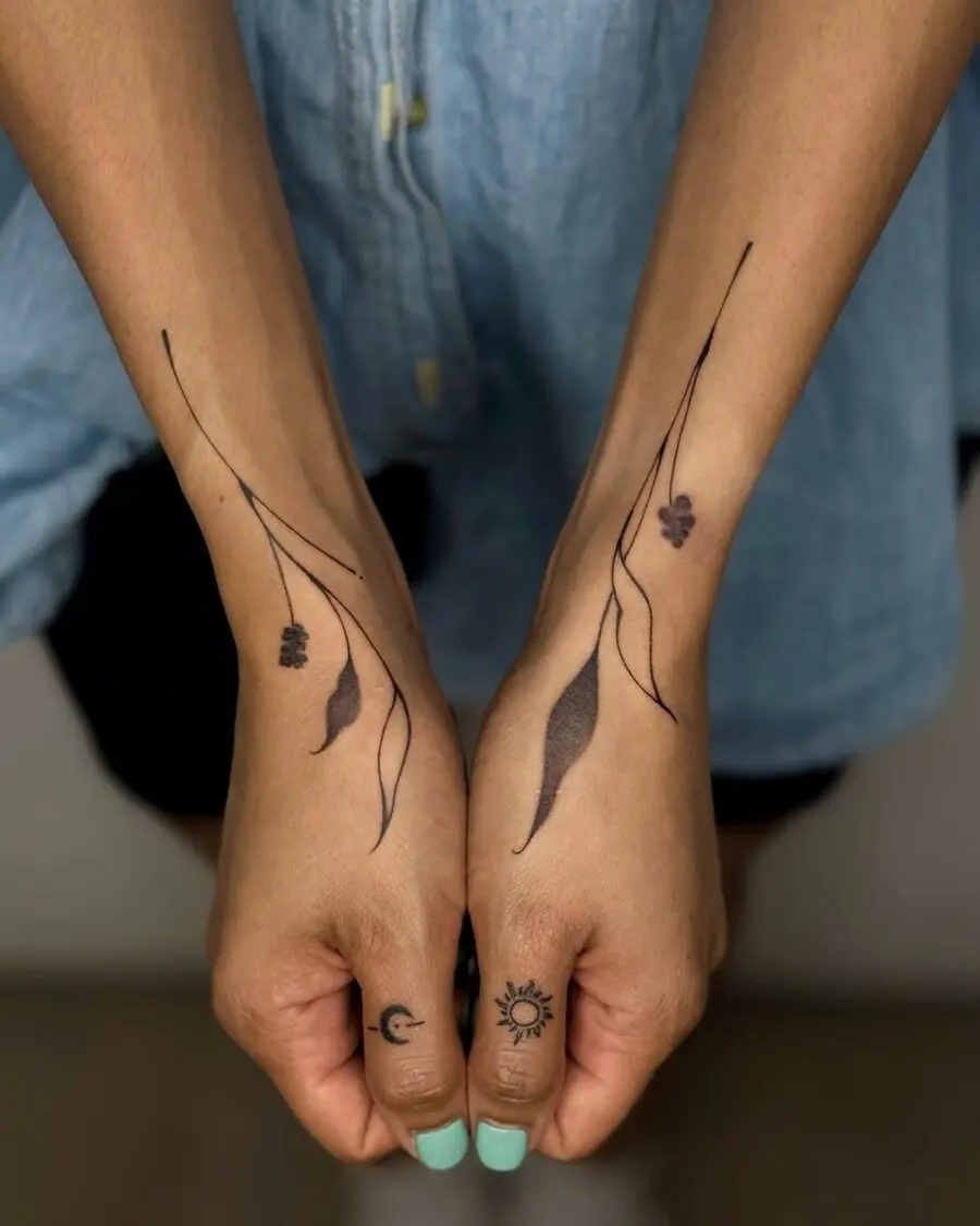 Elegant floral designs for side hand tattoos