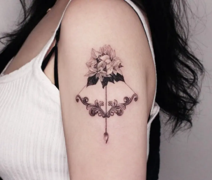 Elegant poinsettia tattoo with ornate details