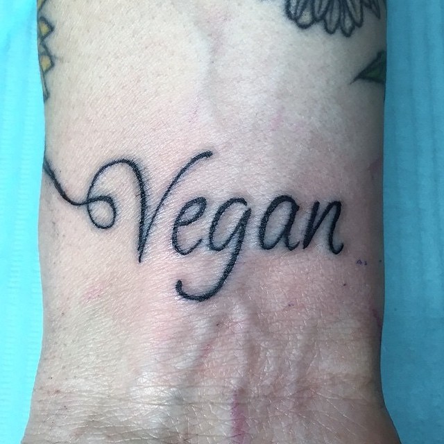 Stylish vegan tattoo for a plant-based lifestyle