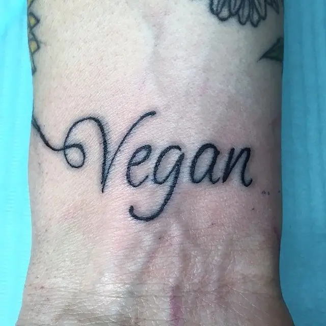 Stylish vegan tattoo for a plant-based lifestyle