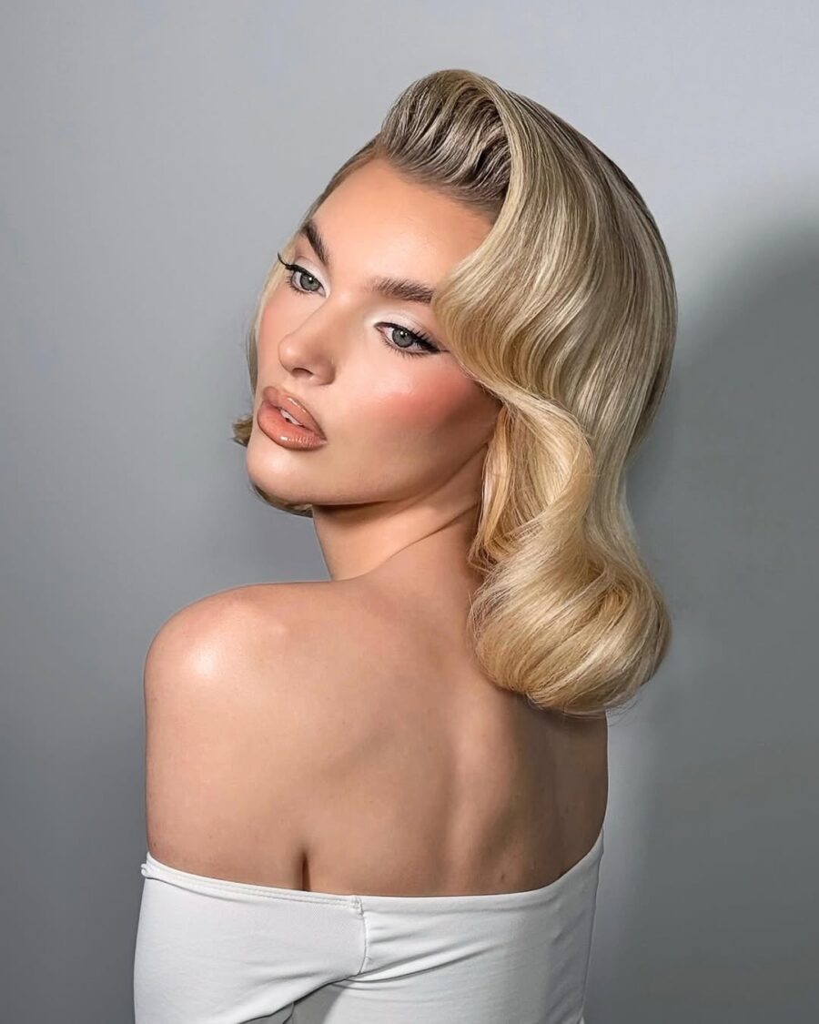 Chic vintage-inspired short blonde hairstyle