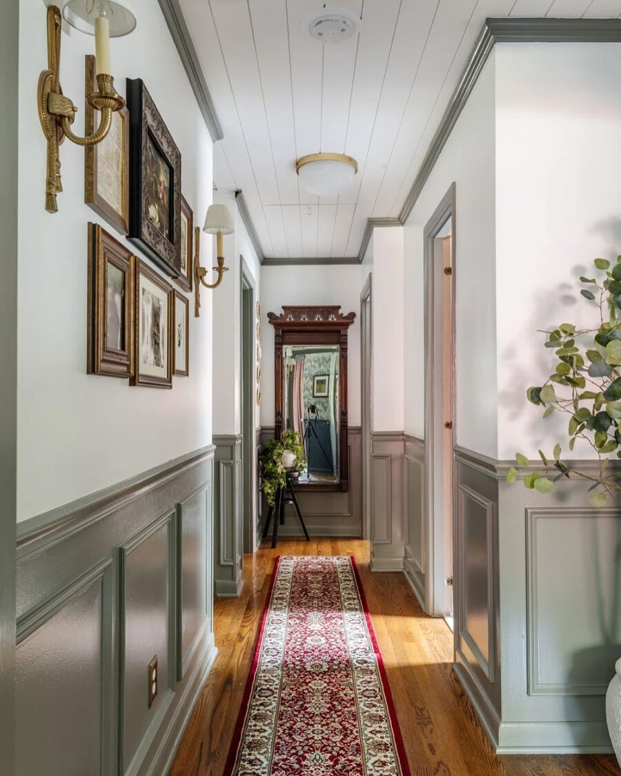 Elegant hallway design with a gallery wall