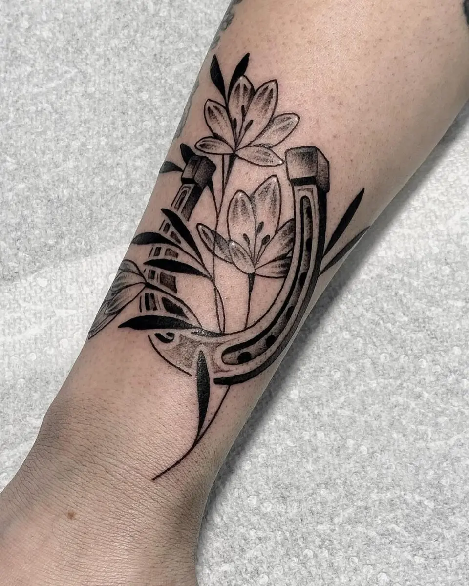 Stylish Horseshoe Tattoo with Floral Elements